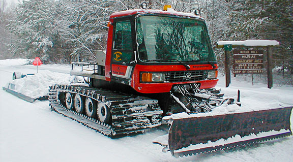 Snowmobile trail groomer